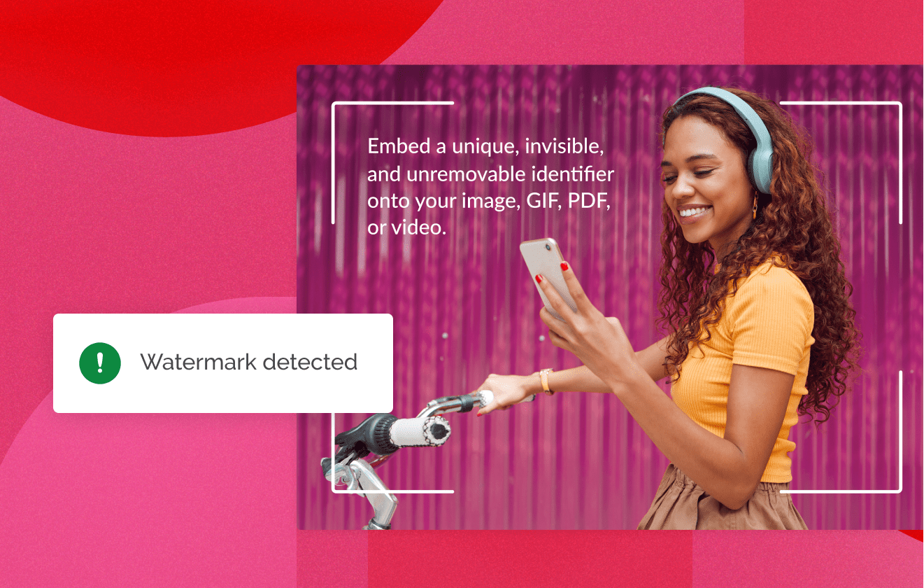 Happy women on her bike, smiling, looking down at her phone with white brackets around the image with the Watermark detected image popup on a magenta geometric faded background
