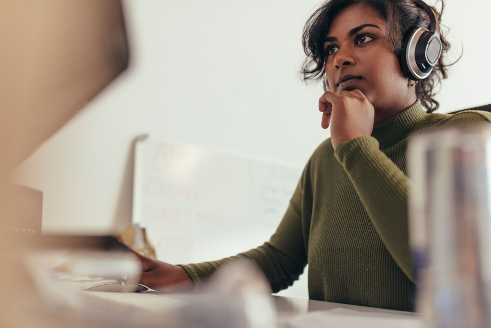 Student on her computer working