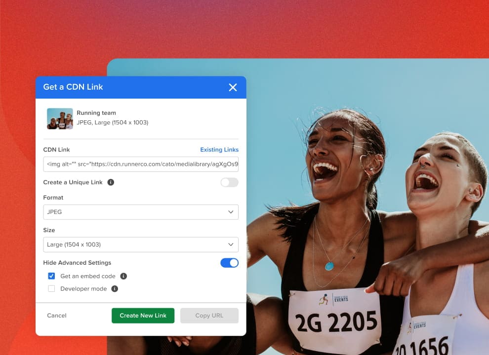 Two smiling runners with a screen showing a CDN link to the asset