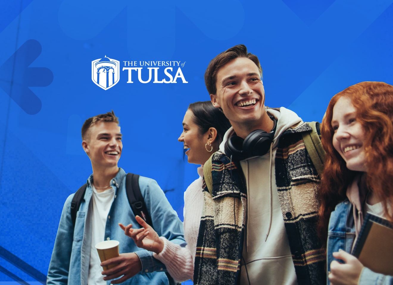 UTulsa MediaValet Case Study. Group of students laughing against a blue background.