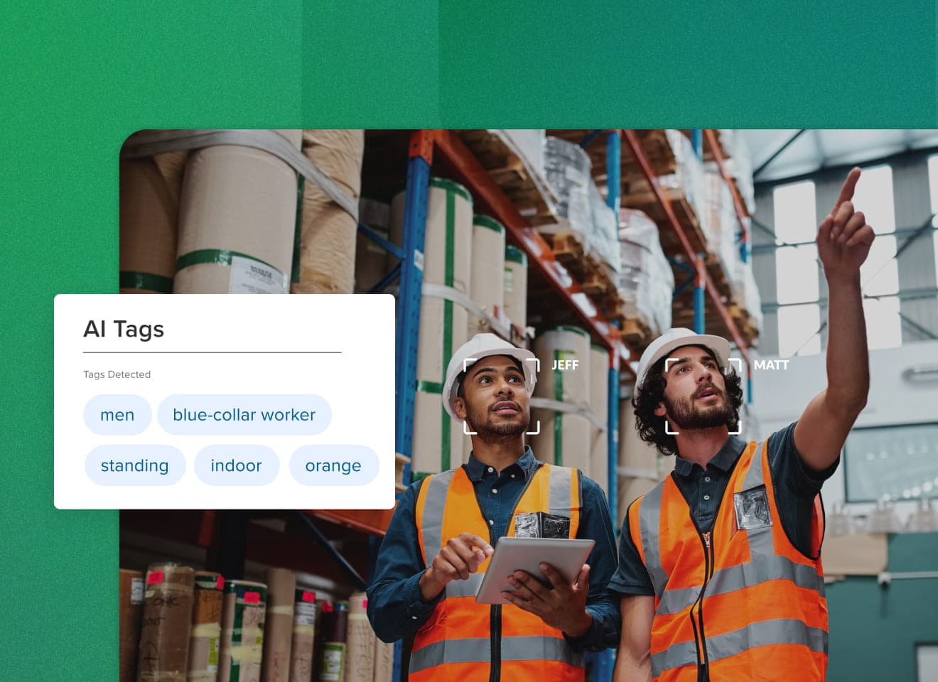 an image with two men in safety hard hats working in a warehouse with their faces framed in MediaValet's face recognition and an overlay of a module with MediaValet's AI Tagging system