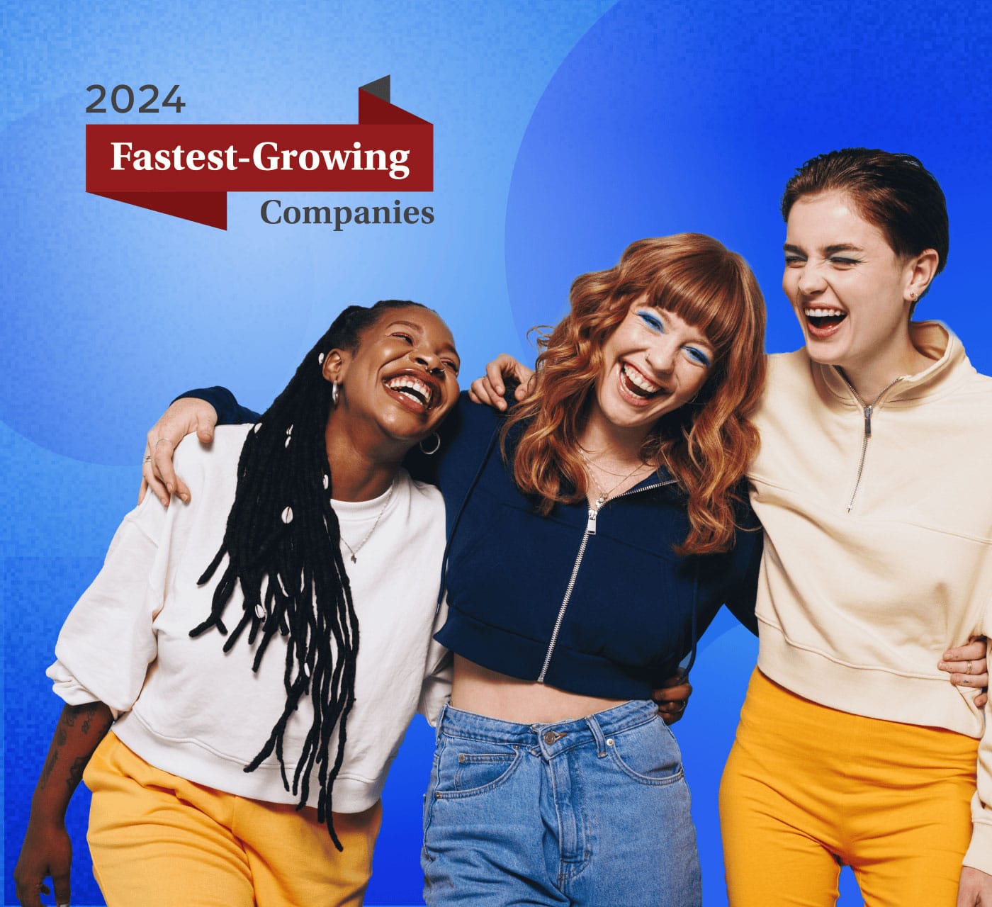 3 woman celebrating and smiling for Mediavalet's win on ranking 27th in fastest growing company in bc