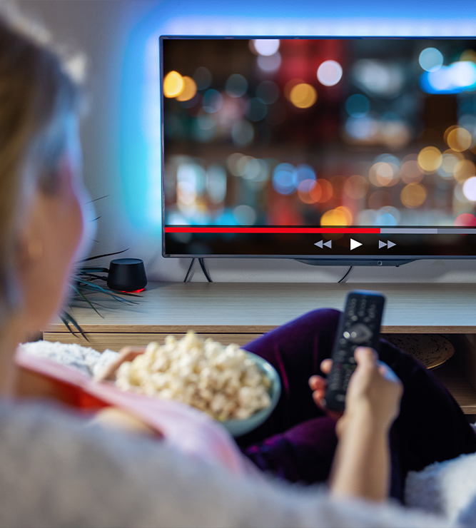 Woman streaming video at home