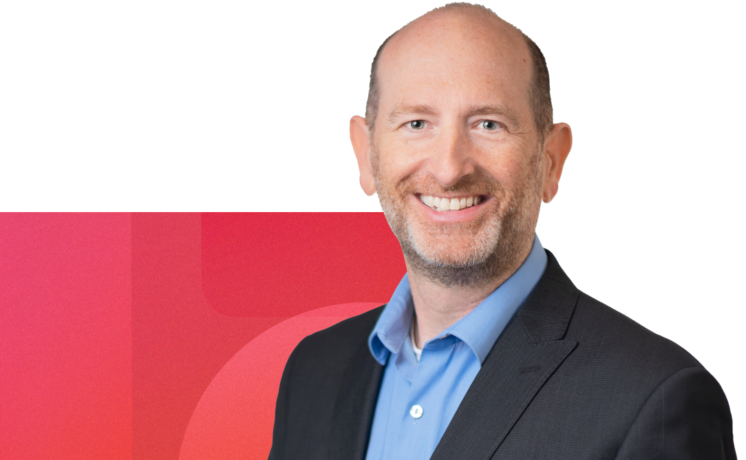Headshot of Todd Dubnicoff from UCSF with a geometric red background
