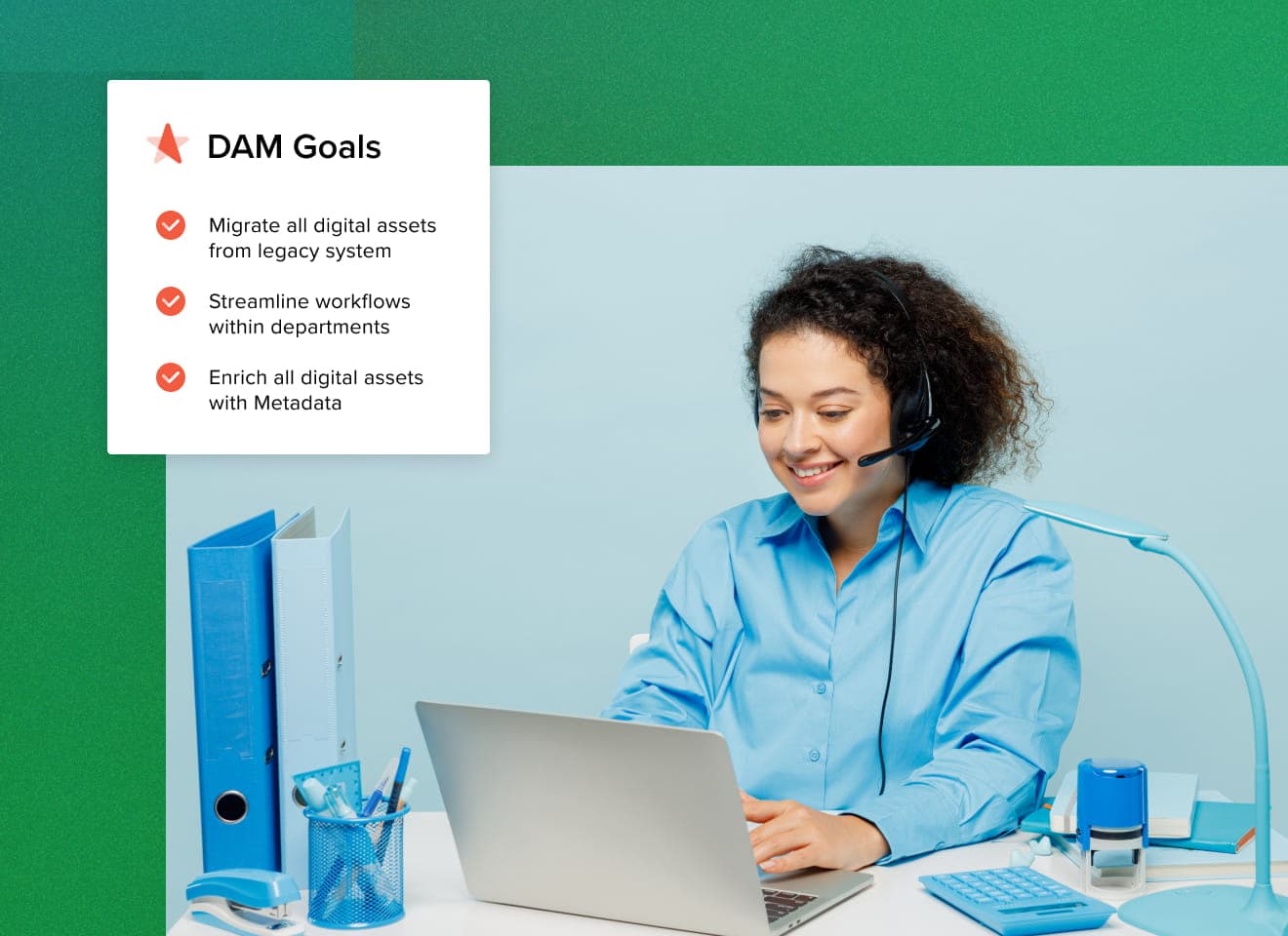 Female MediaValet customer support representative on a laptop smiling with a floating DAM Goals list at the top left
