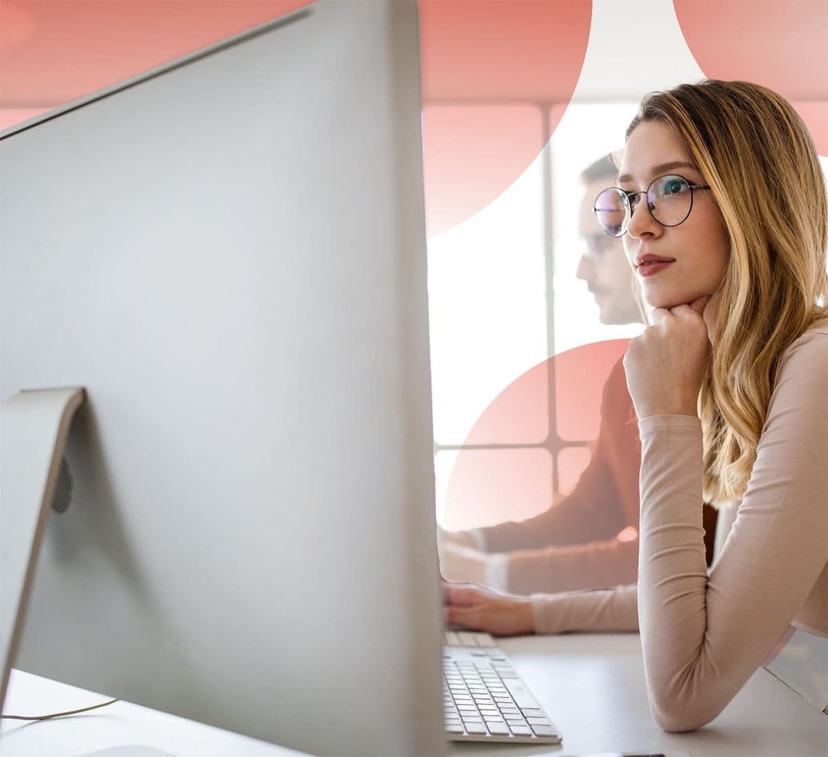 Female art director doing design work on an iMac
